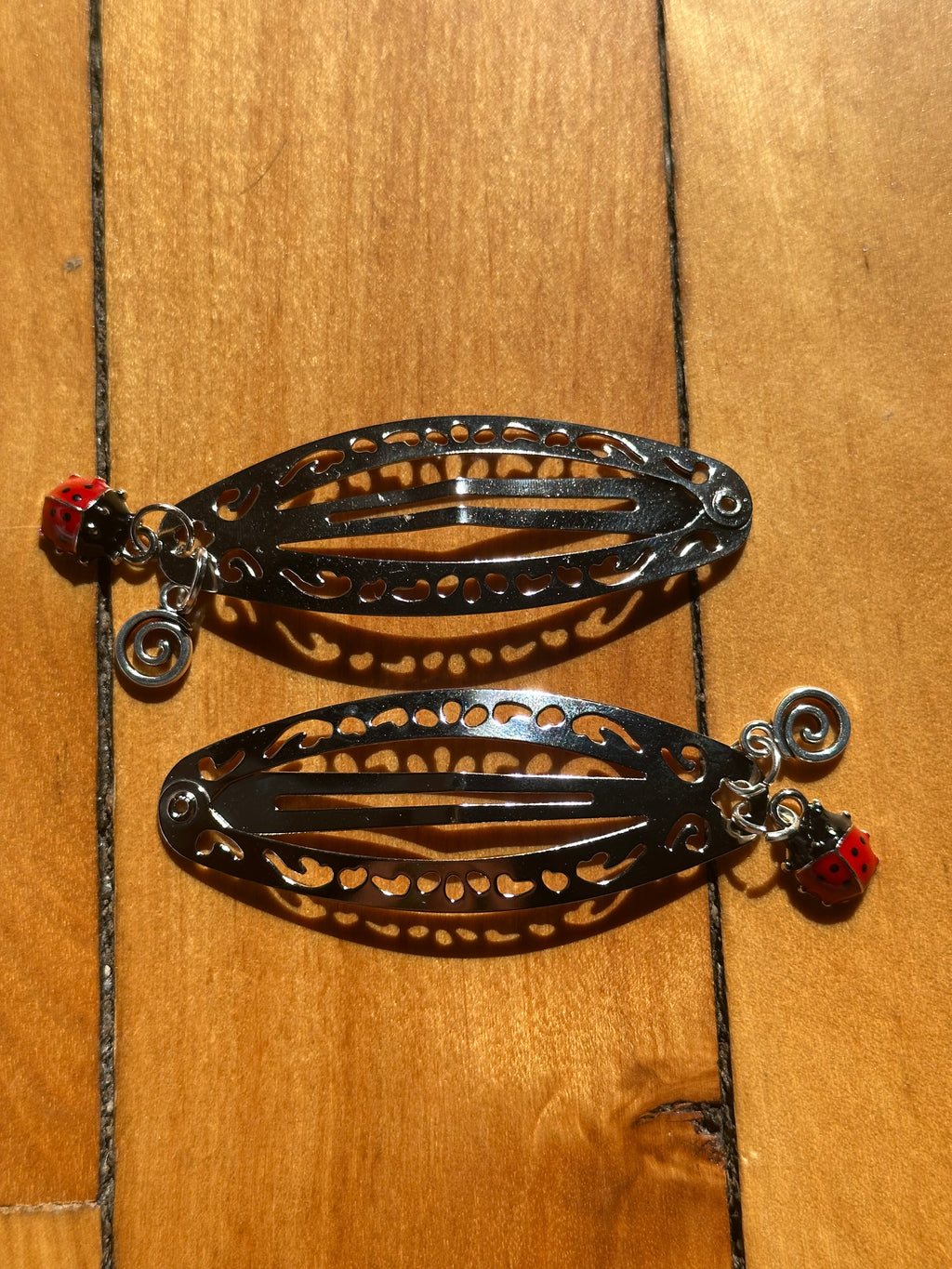 Silver Ladybug Swirl Charm Hair Clips