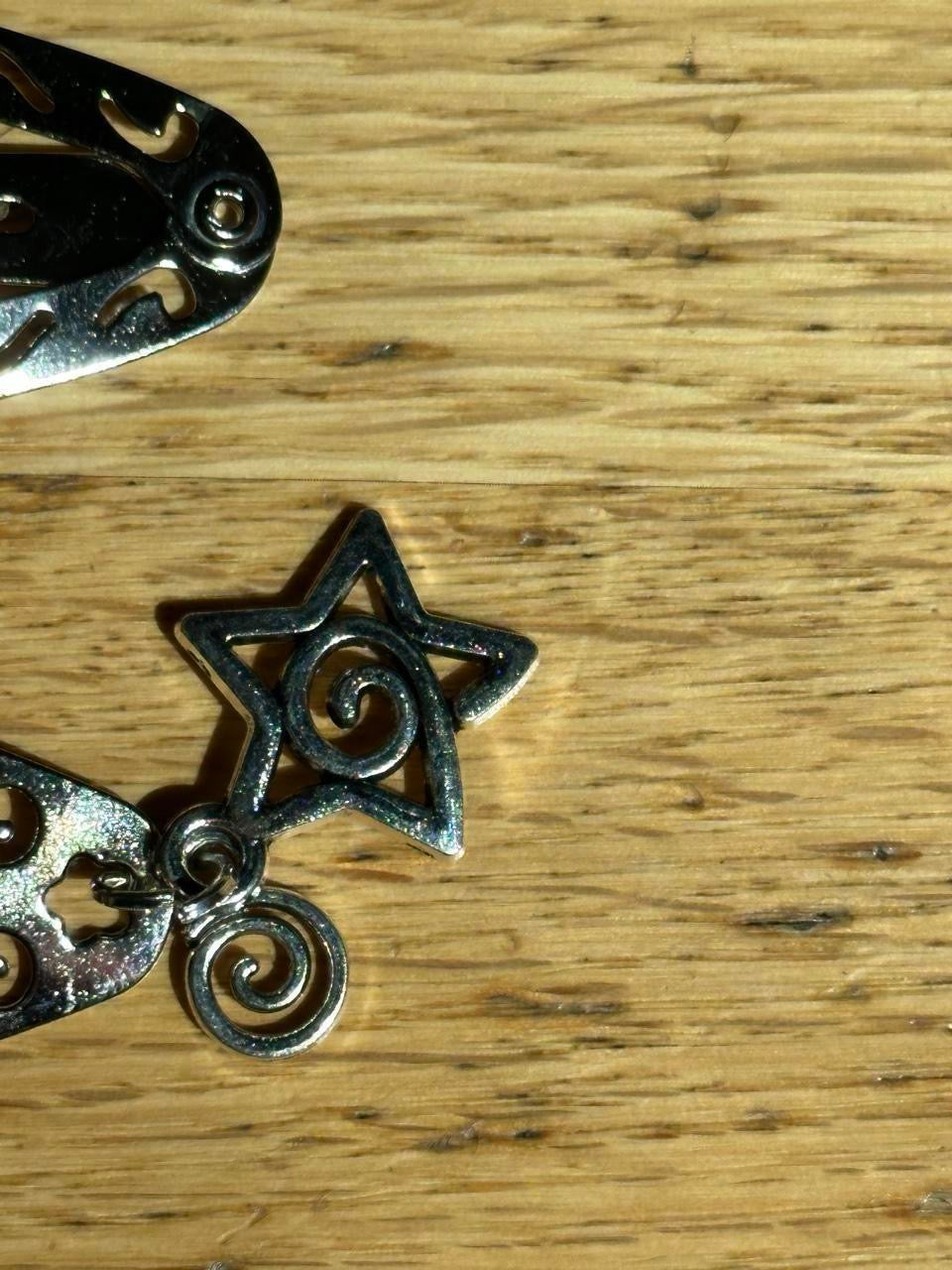 Silver Star Swirl Charm Hair Clips